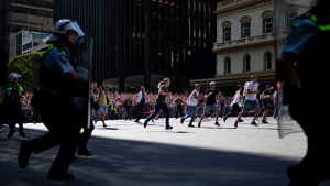 INVASION DAY: Explosive Thrown Into Rally Crowd