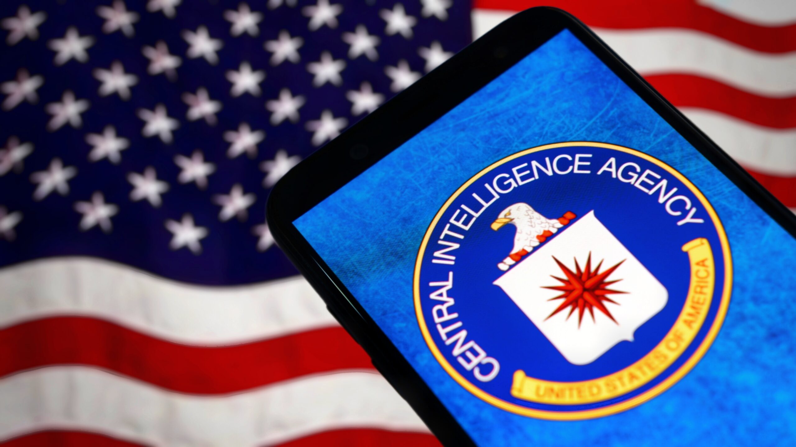 CIA logo displayed on smartphone with American flag