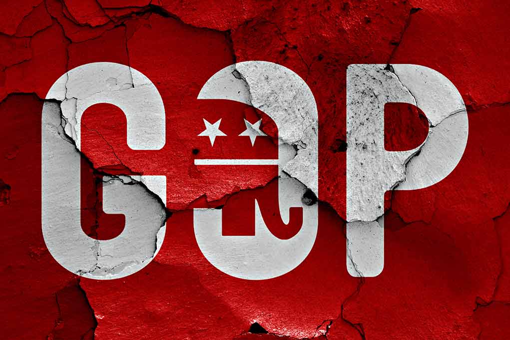 GOP logo with elephant on cracked red surface.