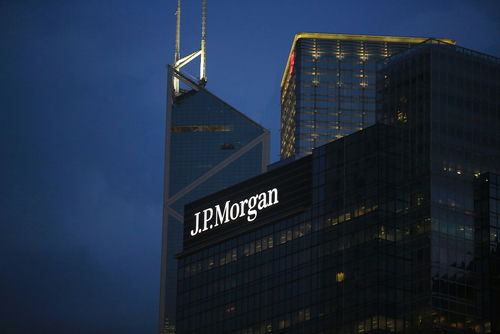 J.P. Morgan building illuminated at dusk.